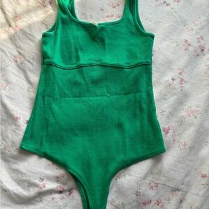 Green Bodysuit with Sleeveless Design and Form-Fitting Silhouette